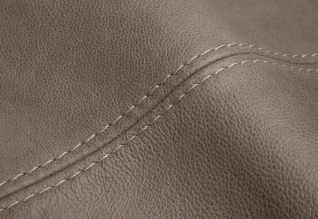 Treated aniline leather
